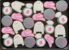 decorated cookies in the shape of sweaters and hats