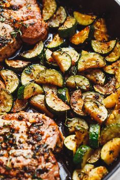 some meat and vegetables are cooking in a pan