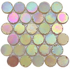 an array of different colored circles on a white background with gold and silver foiling