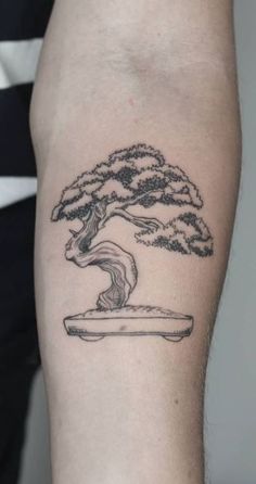 a person with a tattoo on their arm