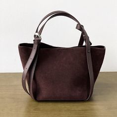 Material: Split Leather Vegan Leather Trim Comes with a built-in pouch Lining: Fabric Size: 33*17*20CM(13*7*8")approx Strap: 19-38 cm Casual Burgundy Rectangular Shoulder Bag, Versatile Brown Canvas Bag With Double Handle, Versatile Burgundy Shoulder Bag With Removable Pouch, Versatile Burgundy Satchel Bag, Burgundy Rectangular Bag With Handles, Brown Top Handle Canvas Bag With Adjustable Strap, Burgundy Shoulder Bag For Daily Use, Brown Baguette Bag Tote With Top Carry Handle, Brown Canvas Crossbody Bag With Top Handle