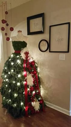 a decorated christmas tree in the corner of a room