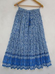 "ITEM DESCRIPTION Indian blue flower printed cotton long maxi skirts - summer season with tassel women long skirts Material: 100% cotton cambric soft crinkled fabric Length: - 38 inch long Waist :-28.00 inch full (14 inch half) 28 inch relaxed can stretch up to 50 inch Size: free size (fit to all) PRODUCT NAME: - Long Women Maxi skirts Ladies Vintage Long skirts Company Return Policy: Please write for more information to my email directly CHOOSE \"ASK SELLER QUESTION \" payment policy:- we accep Long Maxi Skirts Summer, Crinkled Fabric, Maxi Skirts Summer, Indian Blue, Skirts Summer, Clothing Diy, Casual Wear Women, Travel Wear, Womens Maxi Skirts