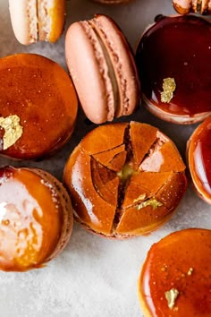 several different types of doughnuts on a table