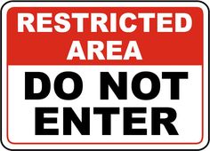 a red and white sign that says restricted area do not enter