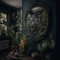 a mirror and some plants in a room