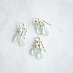 These tiny sea foam frosted glass earrings are so cute and dainty. They're made with recycled glass to resemble sea glass and accented with aqua dyed jade rondelles. They measure 12-16mmx6-11mm in size. **Last pic shows the various shapes. If there's a specific one you want leave me a message in the notes section otherwise they will be chosen randomly. Sea Glass Art Projects, Earrings Beach, Glass Art Projects, Sea Glass Earrings, Sea Glass Art, Sea Glass Jewelry, Beach Glass, Glass Earrings, Beach Jewelry