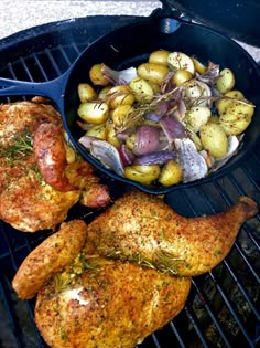 chicken, potatoes and vegetables cooking on an outdoor grill