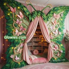 this is a bedroom decorated in pink and green with butterflies on the walls, curtains, and bookshelves