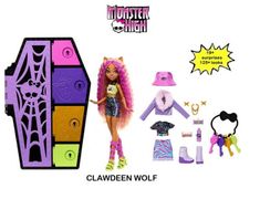 the monster high claw doll is in its box and has accessories for her to wear