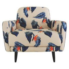 a white chair with blue and orange leaves on it's armrests, against a white background