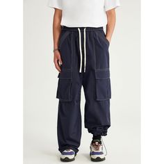 N-256-34 Casual Blue Full-length Cargo Pants, Urban Style Blue Pants For Winter, Urban Style Blue Winter Pants, Casual Parachute Pants With Multiple Pockets For Winter, Urban Blue Winter Pants, Winter Utility Nylon Parachute Pants, Urban Blue Pants With Pockets, Urban Style Blue Winter Bottoms, Winter Blue Bottoms With Pockets