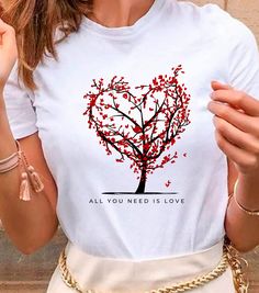 Beautiful tree shirt with a beautiful phrase. *ABOUT OUR SHIRT*¨ -100% Airlume combed and ringspun cotton (fiber content may vary for different colors) -Light fabric (4.2 oz/yd² (142 g/m²) -Runs true to size ¨*WASH/CARE INSTRUCTIONS*¨ -Wash before use. -Inside out, wash with delicate cycle. -Wash with cold water. -Do not bleach. -Do not iron directly onto the design. -Do not dry clean. ¨*HOW TO ORDER*¨ -Before you place the order, please review all the information. -Select the garment SIZE and garment COLOR. -Select the quantify. -Click Add to Cart. -For multiple items go back to the listing and repeat the steps. Thank you for trusting us!. Summer Gift T-shirt With Text Print, Red T-shirt For Summer Gift, Summer Heart-shaped Letter Print T-shirt, Casual Cotton T-shirt For Valentine's Day, Casual Red T-shirt For Mother's Day, Casual T-shirt With Heart Graphic For Gift, Casual Red T-shirt For Gift, Casual White Shirt As Gift, Casual White Shirt As A Gift