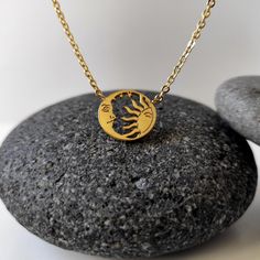 "This golden Sun and moon with stars necklace is a great everyday accessory. The circular shape alone is a symbol of the never-ending circle of life. Placing a half-moon and half sun inside the circle supplies even more meaning. The sun is often recognized as a symbol of rebirth, strength, and power. The moon is associated with the female in many cultures often in the form of a goddess. Perfect for New life Gift, Gift For Her, Wedding Gift Bridesmaid, etc. Diameter of the pendants: almost 1/2\" x 1/2\" = 1.3 cm x around 1.3 cm All my jewelry is lead and nickel free. I am attaching the sun and the sun and the moon together with a matching chain, which I cut to size to create something pretty just for you. Attached is a sizing guide that gives a rough idea of where the necklace will sit. Dep Spiritual Moon-shaped Everyday Jewelry, Spiritual Sun And Moon Jewelry As Gift, Spiritual Moon Phase Necklace For Everyday Wear, Spiritual Sun And Moon Design Jewelry Gift, Spiritual Moon Phase Necklace For Everyday, Symbolic Sun And Moon Jewelry Gift, Symbolic Sun And Moon Design Jewelry Gift, Everyday Spiritual Moon Phase Necklace, Celestial Stainless Steel Jewelry For Gifts