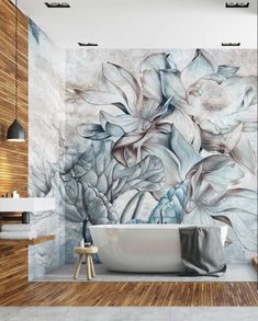 a bathroom with a large mural on the wall and a bathtub next to it