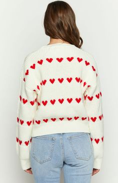 * Red Heart Stripe Jumper 
 * 
 
 * HOW TO STYLE:  
 * The perfect yet super cozy chunky knit () sweater! Style this with a pair of jeans () or a denim () shorts for your beach summer night time. 
 * 
 
 * FEATURES: 
 * Heavy weight knit material 
 * Stretch fabric 
 * Mock neck design 
 * Red knit heart detailing 
 * Cuffed sleeves and bottom hem 
 * Pull on style Knit Heart, Stripe Jumper, Striped Knitted Sweater, Prom Midi Dress, Knitted Heart, 60's Dress, Summer Playsuit, Chunky Knit Sweater, Sweater Crop