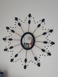 a mirror that is hanging on the wall