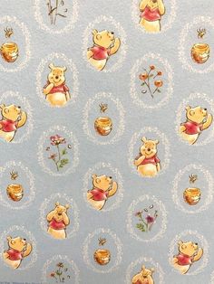 the winnie the pooh wallpaper has been painted on it's blue background