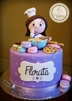 there is a cake that has cookies on it and the name florcita