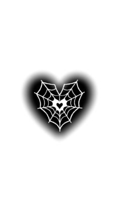 a black and white image of a spider web heart