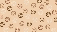 an abstract pattern with smiley faces on a light pink background, which is repeated in brown and white