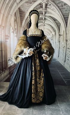 Historically accurate Tudor Gown. Comprising of: 🌹Metallic brocade Kirtle, fully lined with linen 🌹Matching inner sleeves with silk pull throughs 🌹Overgown in choice of top quality fabric and velvet or faux fur bell sleeves. 🌹Matching French or gable hood 🌹Hooped underskirt 🌹Bum Roll Made with care personally by me, and to order in my workshop in the Cotswolds, England. I use a machine to sew these gowns to keep the price affordable as possible, but hand finished for a hand sewn appearance French Traditional Dress, Tudor Fashion Women, Gable Hood, Tudor Gown, The Cotswolds England, Tudor Dress, Hoop Dress, Tudor Fashion, Royalty Dress