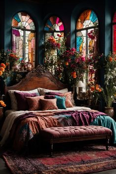 Drift into a dreamscape enveloped by the allure of this bohemian bedroom. Majestic stained glass windows paint a symphony of colors, their mosaic patterns playing with light and shadow. The room's deep blue walls evoke the serenity of twilight, creating a canvas for the abundant florals that cascade like nature's drapery. Nestled amidst this splendor, a grand wooden bed, crowned with ornate carvings, beckons with plush pillows and intricate patterned blankets in hues of violet and teal. Stained Glass Home Decor, Stained Glass Windows In Homes, Bedroom Inspirations Colorful, Regency Home Decor, Turquoise Bedroom, Turquoise Interior, Rustic Bed, Bad Inspiration, Bohemian Wall Decor