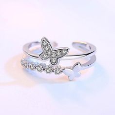 Butterflies are beautiful creatures that represent hope, transformation, and rebirth. They remind us that no matter what happens in life, there is always time to start again. This beautifully crafted ring encourages us to believe in ourselves and never lose faith. Great things are coming. Cubic zirconia crystals Adjustable ring size - one size fits all Hypoallergenic, lead & nickel free If you aren't in LOVE with your purchase, please let us know within 30 days of receiving your item, and you'll receive a stress-free refund. Couple Rings Silver, خواتم خطوبة, Matching Couple Rings, Ladies Rings, Promise Rings For Guys, Edgy Jewelry, Style Rock, Jewelry Accessories Ideas, Butterfly Ring