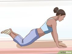 a woman doing push ups on her stomach