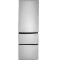 a silver refrigerator freezer sitting on top of a white wall