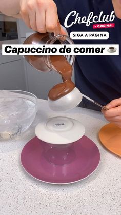 a person pouring chocolate into plates on top of a table