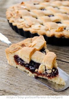 a slice of pie sitting on top of a wooden table