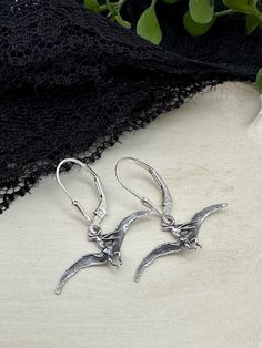 Pterodactyl Dinosaur Earrings. ✦Charm measures 25mm across at widest point ✦Earrings measure 1" from top to bottom ✦Sterling silver earrings hooks or lever backs ✦Material: Sterling silver charm and ear wires ♡ **PLEASE NOTE: THIS LISTING IS ONLY FOR ONE PAIR OF EARRINGS ** 🎁 Comes ready to gift - ready with polishing cloth in a gift box or bag. ♥BUY WITH CONFIDENCE♥  Please know I take customer service very seriously! There is nothing I want more than a happy customer and! If you have any ques Dinosaur Jewelry, I Want More, Dinosaur Earrings, Happy Customer, Pinterest Closet, Sterling Silver Charm, Earrings Silver, Dinosaurs, Ear Wires