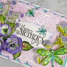 a mother's day card with purple flowers and butterflies on the front, in pastel colors