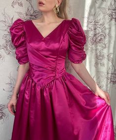 Transport yourself to a fairytale era with this enchanting vintage satin pink Cinderella-style dress. This women's maxi ball gown dress exudes timeless elegance with its puffed sleeves, reminiscent of a bygone era. The delicate satin fabric drapes gracefully, while the open back adds a touch of contemporary allure. Embrace the nostalgia of the 1950s with this dress, perfect for formal events and capturing the essence of classic romance. Pair it with heels for a traditional look or wear it with b Hot Pink Prom Dress, Lace Back Dresses, Pink Prom Dress, Taffeta Dress, Prom Dresses Ball Gown, Women Maxi, Ball Gown Dresses, Historical Dresses, Satin Dresses