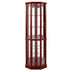 a tall wooden corner display case with glass doors on the top and bottom shelves,