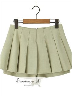 Decoration: Pockets Fabric Type: Twill Pant Style: Shorts Skirts Pattern Type: Solid Fit Type: Regular Fit Style: Vintage Material: Polyester Material: Spandex Origin: Mainland China Waist Type: HIGH Gender: WOMEN Item Type: Shorts Closure Type: Zipper Fly Material Composition: POLYESTER please check the size chart carefully. Description Material: polyester Available Colors: BLACK, WHITE, ARMY GREEN Available Size: S , M , L S--- Waist: 70cm, Hips: 108cm, Length: 29cm M --- Waist: 74cm, Hips: 11 Fitted Tennis Skirt With Pockets For Spring, Spring High Waist Non-stretch Skort, High Waist Non-stretch Spring Skort, High Waist Solid Color Tennis Skirt, High Waist Solid Color Summer Tennis Skirt, High Waist Solid Color Tennis Skirt For Summer, High Waist Pleated Skirt For Spring, Solid High-waist Tennis Skirt For Spring, Spring High Waist Stretch Tennis Skirt