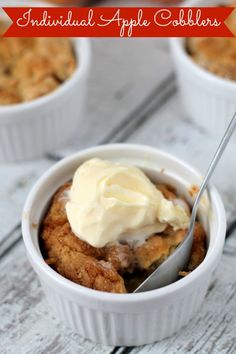 three small white bowls filled with dessert on top of a wooden table