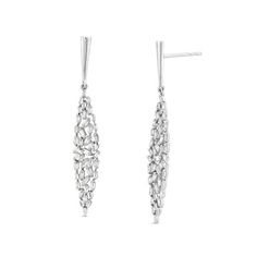 These unique mosaic style earrings are crafted with baguette cut diamonds. Modern Diamond Cut Diamond Earrings For Evening, White Gold Baguette Cut Evening Earrings, White Gold Baguette Cut Earrings For Evening, Modern Diamond Cut Evening Diamond Earrings, Formal Sterling Silver Earrings With Baguette Diamonds, Formal Baguette Diamond Drop Earrings, Formal Sterling Silver Baguette Diamond Earrings, Sterling Silver Baguette Diamond Earrings For Formal Occasions, Evening Baguette Diamond Dangle Earrings