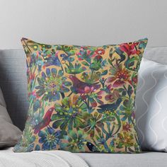 a colorful floral pattern on a yellow background throw pillow with the words, flowers and birds