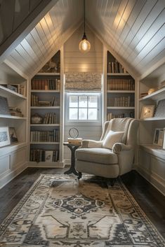 a room with a chair, bookshelf and rug on the floor in front of it