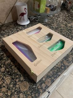 an open wooden box sitting on top of a counter