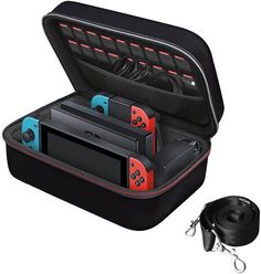 an open case with two video game controllers in it and a lanyard attached to the inside