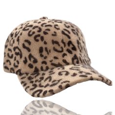 Dani & EmFuzzy Leopard Baseball Cap An adorable faux fur fuzzy leopard baseball cap.This super stylish cosy hat will keep you looking good and feeling warm. Comfortable and fashionable and perfect for casual wear, daily wear, outer wear, work wear, travel, and sport’s. Features a soft faux fur material which will keep your head warm and adds that special accent touch to any favorite top, sweater, jeans, winter coat, jacket, vest, scarf or more. An absolutely gorgeous addition to any wardrobe! One Size - Circumference: 56cm-60cm/22.0"-23.6"; Adjustable; Great fit for most teens and adults. Design : The leopard print baseball hat features an all over leopard print design Casual Faux Fur Beanie Hat, Casual Faux Fur Beanie, Trendy Brown Baseball Cap For Winter, Trendy Brown Winter Baseball Cap, Trendy Winter Baseball Cap, Trendy Winter Flat Cap Baseball Cap, Trendy Winter Baseball Cap With Curved Brim, Casual Hats With Adjustable Faux Fur Lining, Casual Adjustable Hat With Faux Fur Lining