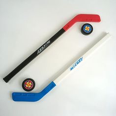 three different types of sports equipment on a white surface