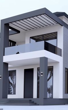 a white and gray modern house with black trim on the front door, windows, and stairs