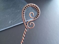 "This beautiful hair stick is made with solid copper wire, twisted, shaped and wrapped just to give you a unique experience. This stick measures 6.5\" in total. The paisley part has 4.5cm x 3cm (1.8\" x 1.2\") and the stick part has 5\" approximately. But if you need one shorter or larger leave the measurement in checkout. All the edges were well smoothed so that it will not harm your hair and skin. All of my items are 100% handmade. Each piece is made in the design shown but, will have slight v Wire Wrapped Hair Pins, Copper Hair Pin, Hair Crystals, Diy Baubles, How To Clean Silverware, Minimalist Hair Accessories, Hair Forks, Chopstick Hair, Galaxy Jewelry