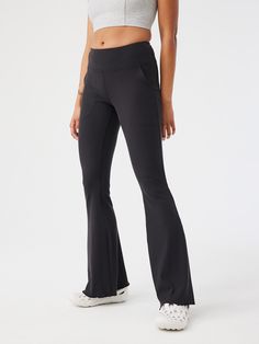 Body-hugging with the perfect bell-bottom, these limited edition ribbed pants add extra flair to your everyday. Made in our new SuperForm� Rib fabric, featuring a wide waistband to hold you in and pockets for extra storage. Product was formerly called Rib Flare Pant. Ribbed Flare Pants, Flare Pants Black, Rib Flare, Ribbed Pants, Ribbed Flares, Coloured Leggings, Flex Leggings, Color Block Leggings, Flare Pant