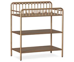 a gold metal shelf with three shelves on each side and one shelf below the shelf