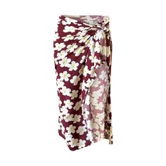 Crafted from a recycled ECO-RAYON fabric, this luxe wrap sarong is a sustainable choice that looks and feels luxurious. A lightweight fabric drapes elegantly, adding a stylish touch to your beach wardrobe. This versatile wrap can be worn short or long in many different ways, and is perfect for making a statement on a hot summer day. STYLE TIP: Wear long or short, as a dress or beach towel. Folds in multiple ways, find us on social for all the hacks! Exclusively Hanakini Prints Material: Rayon an Beachy Wrap Sarong For Beach Cover-up, Bohemian Sarong For Day Out, Floral Print Sarong Beachwear, Spring Vacation Wrap Sarong, Bohemian Summer Sarong For Day Out, Bohemian Sarong For Summer Day Out, Flowy Sarong For Summer, Bohemian Wrap Skirt For Summer, Summer Draped Wrap Skirt